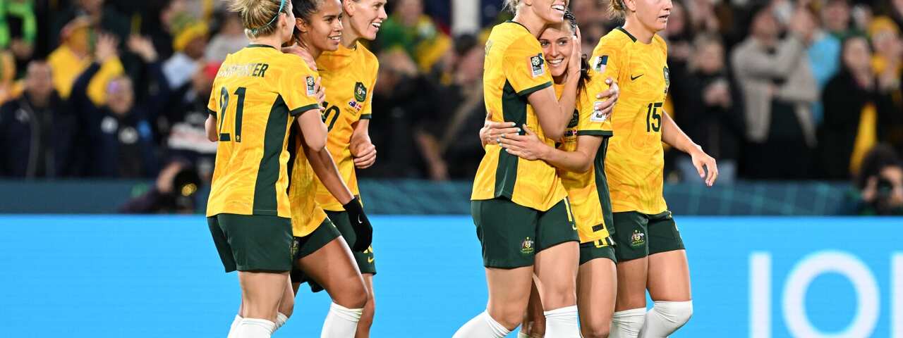 The Matildas celebrate after scoring a goal