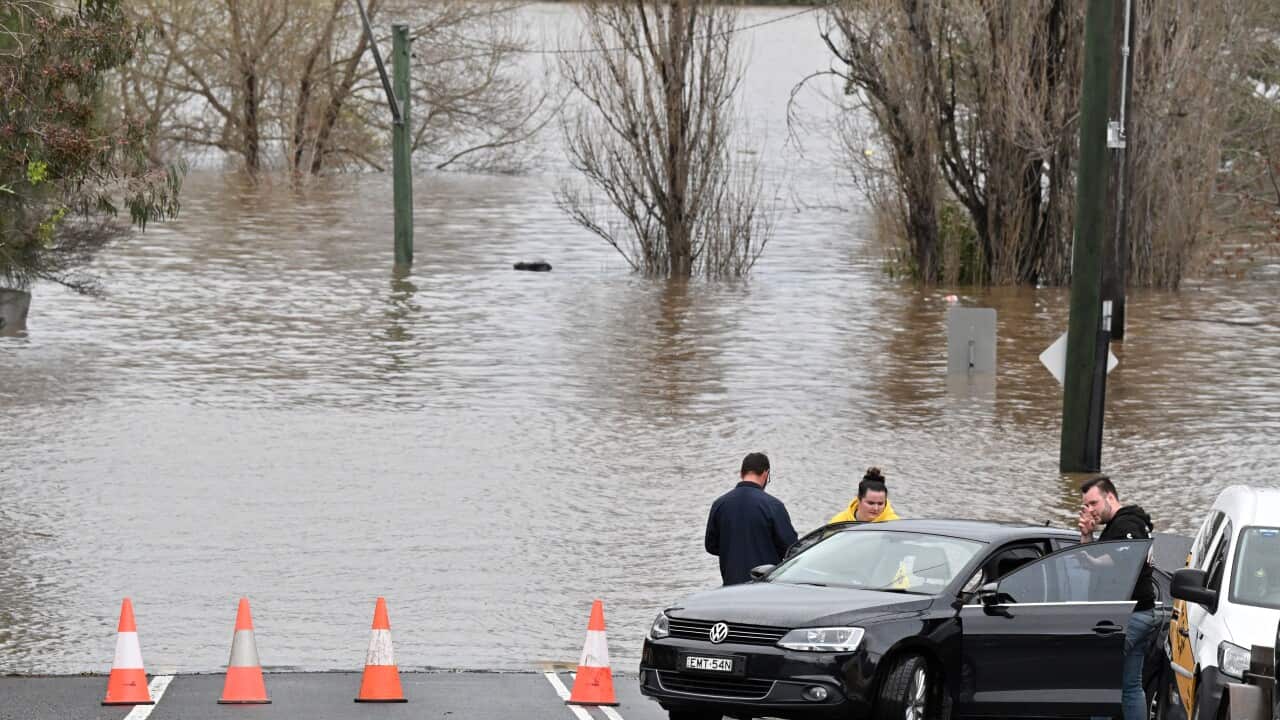 A road is seen cut off by floodwaters in Camden.