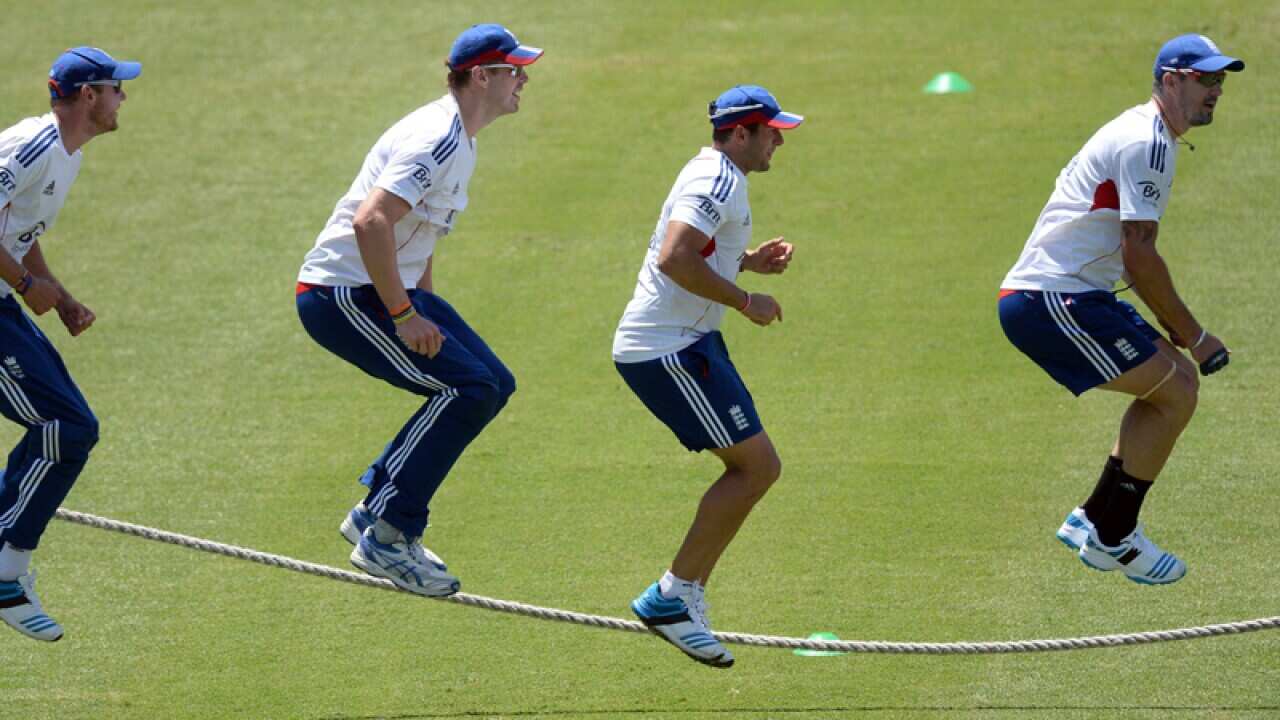 English cricketers skip during a practice session