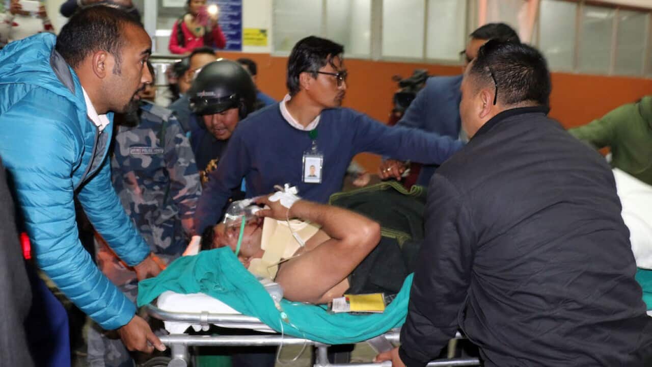 US Bangla plane crash victims rushed to a hospital in Kathmandu. March 2018.