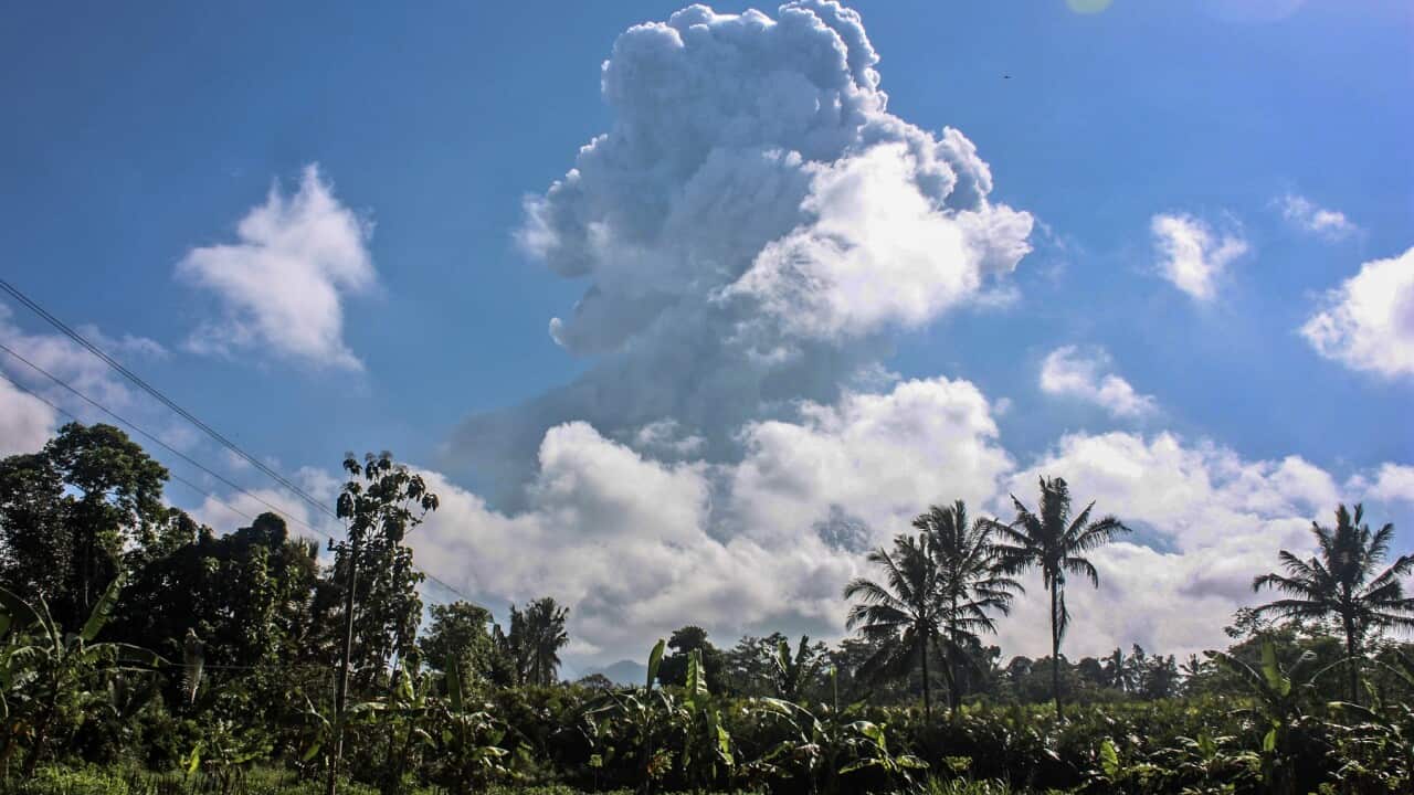 Mount Merapi spews volcanic materials during an eruption as seen from Sleman, Indonesia, 21 June 2020.  