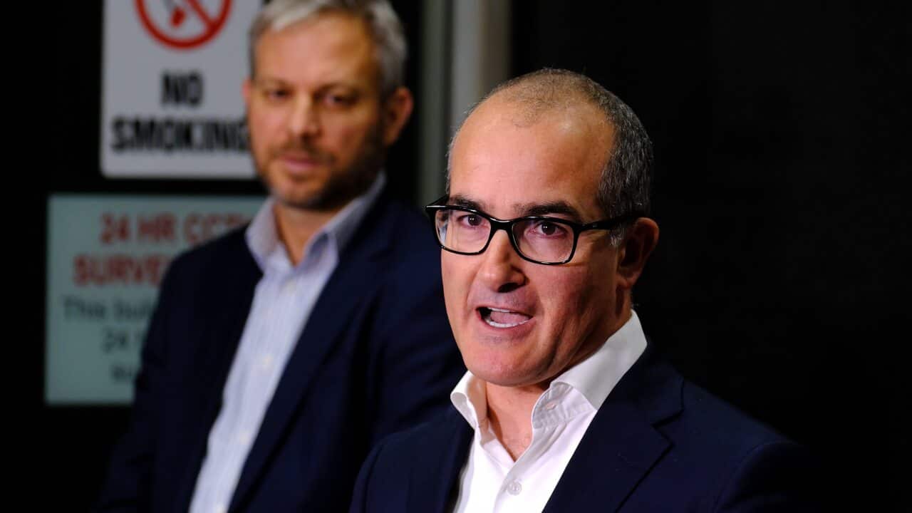 Acting Victorian Premier James Merlino with Victorian Chief Health Officer Brett Sutton during a press conference in Melbourne.