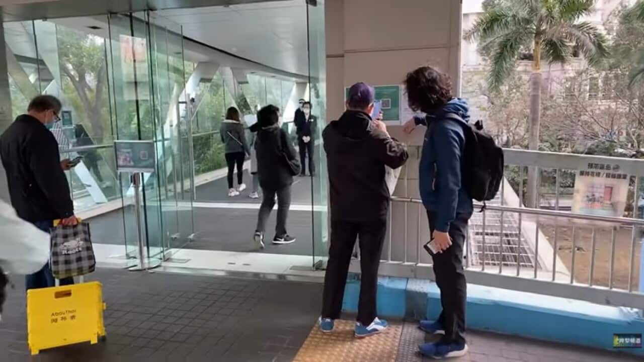 Vaccine_Pass_in_Olympian_City_Phase_3_bridge_Wikimedia Commons Barry Ma TV CC BY 3.0.jpg