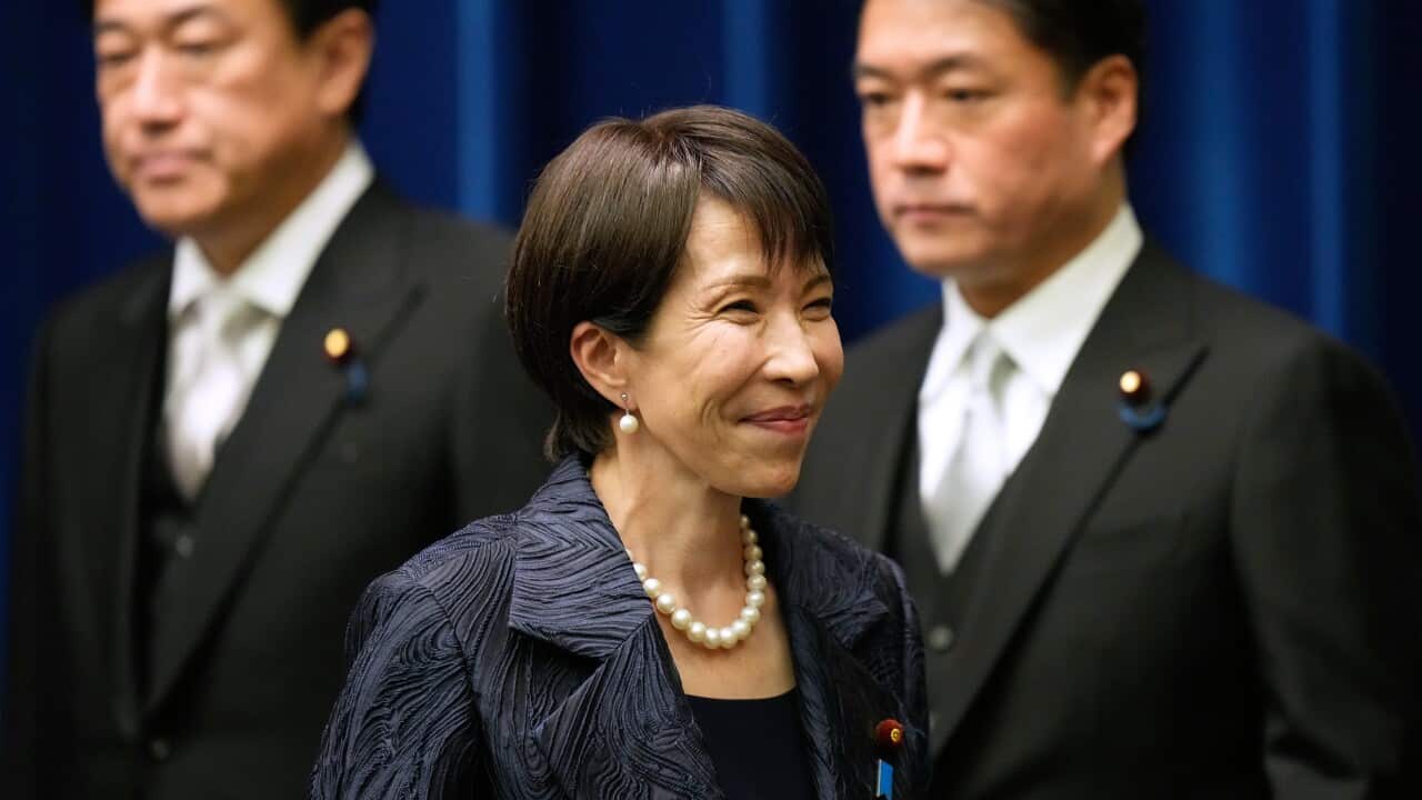 Japan's new Prime Minister Sanae Takaichi leaves after attending a press conference at the prime minister's office in Tokyo, Japan, Tuesday, Oct. 21, 2025