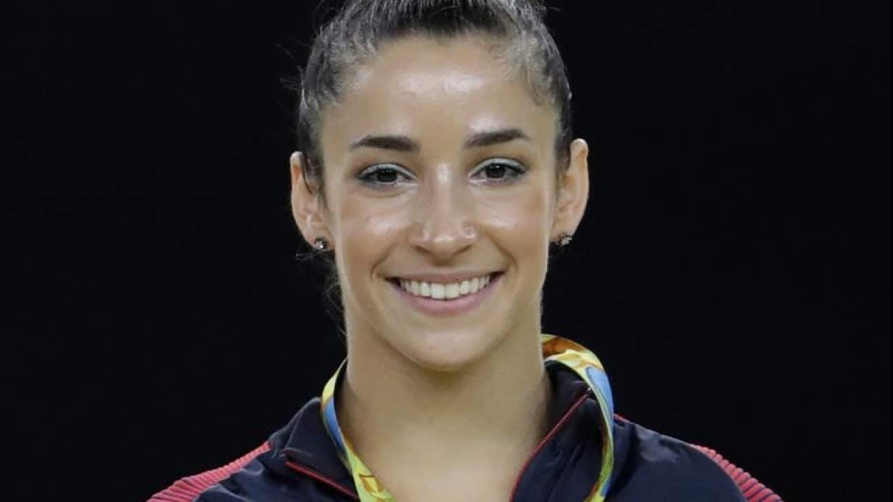 US gymnast Aly Raisman shows off her 2016 Olympics silver medal