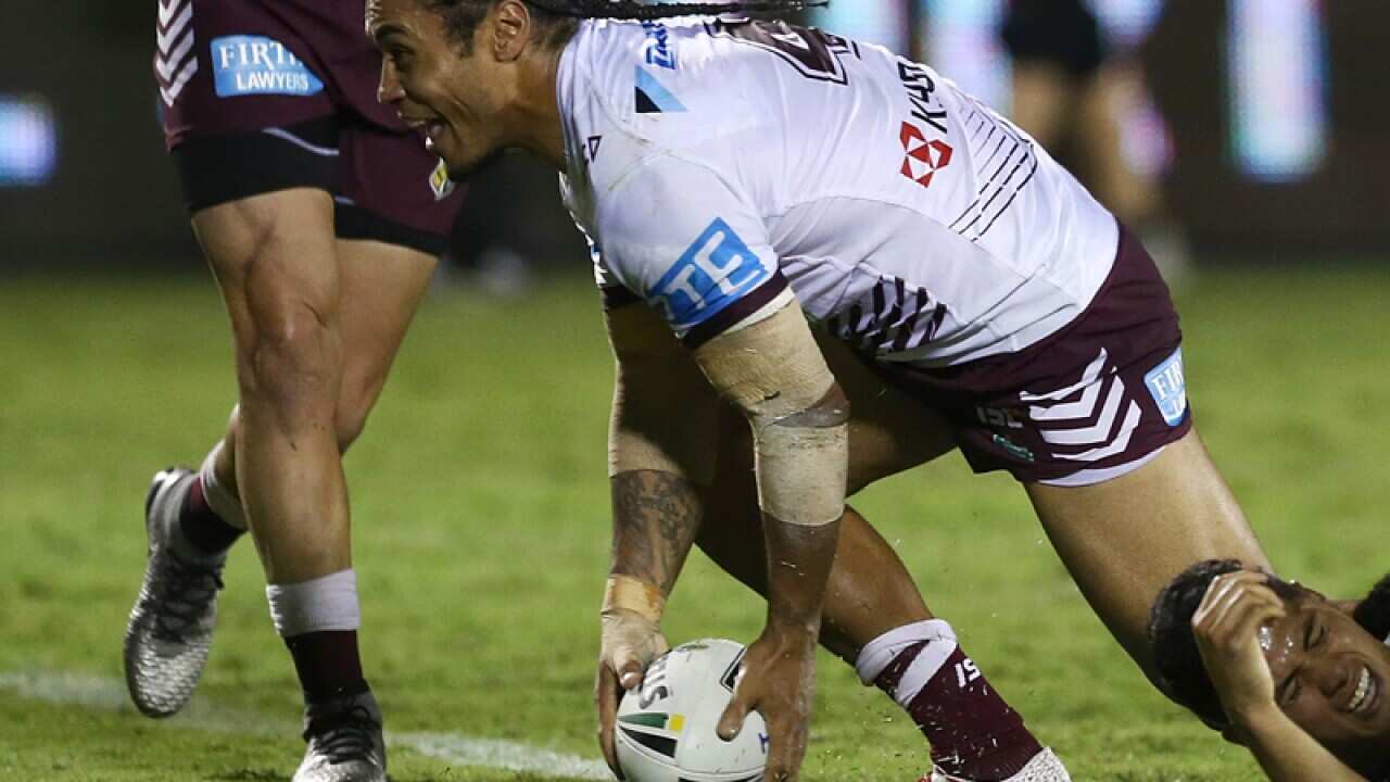 Manly centre Steve Matai scores a try