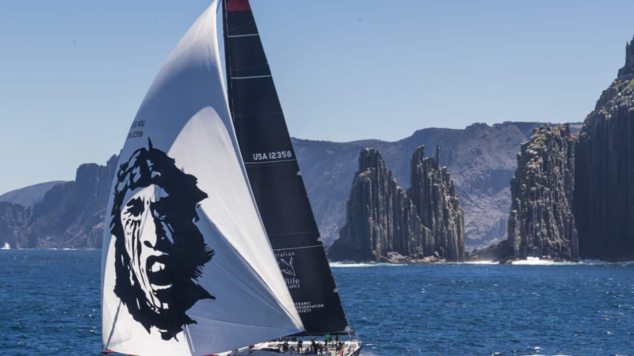 US supermaxi Comanche competes during the Sydney to Hobart yacht race