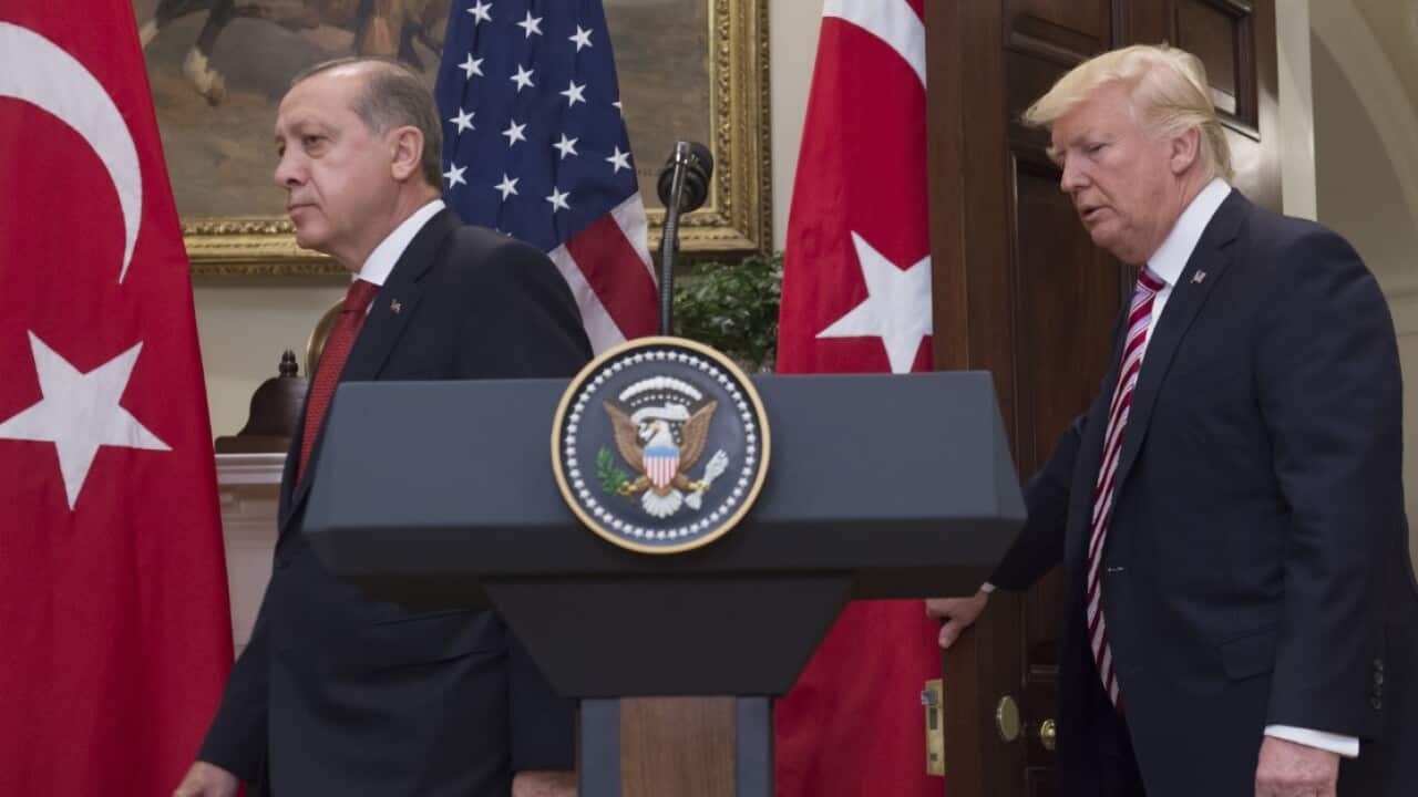 File: US President Donald Trump and Turkish President Recep Tayyip Erdogan arrive to speak to the press in the Roosevelt Room