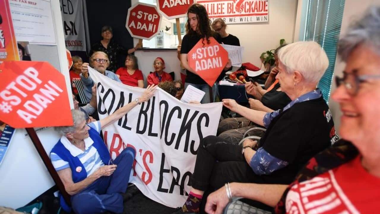 Grandparents protest inside the office of Anthony Albanese.