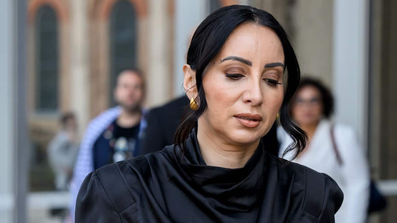 Antoinette Lattouf outside, dressed in black