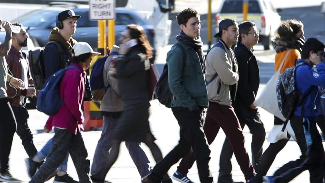 City commuters are seen in Sydney.