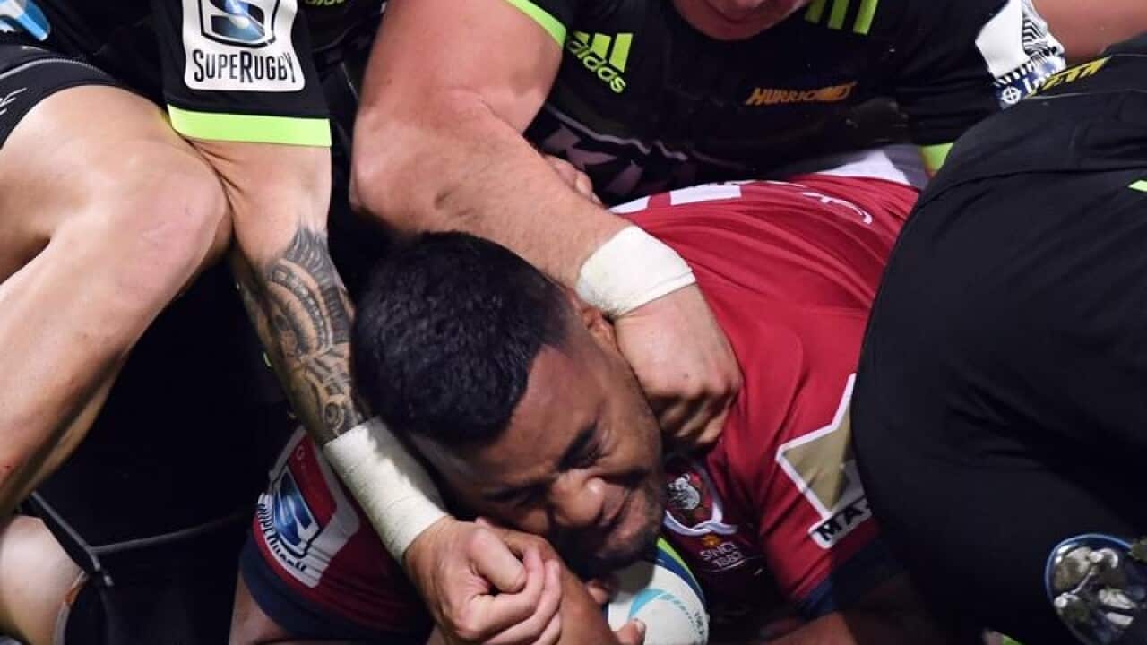 Taniela Tupou scores for Queensland.