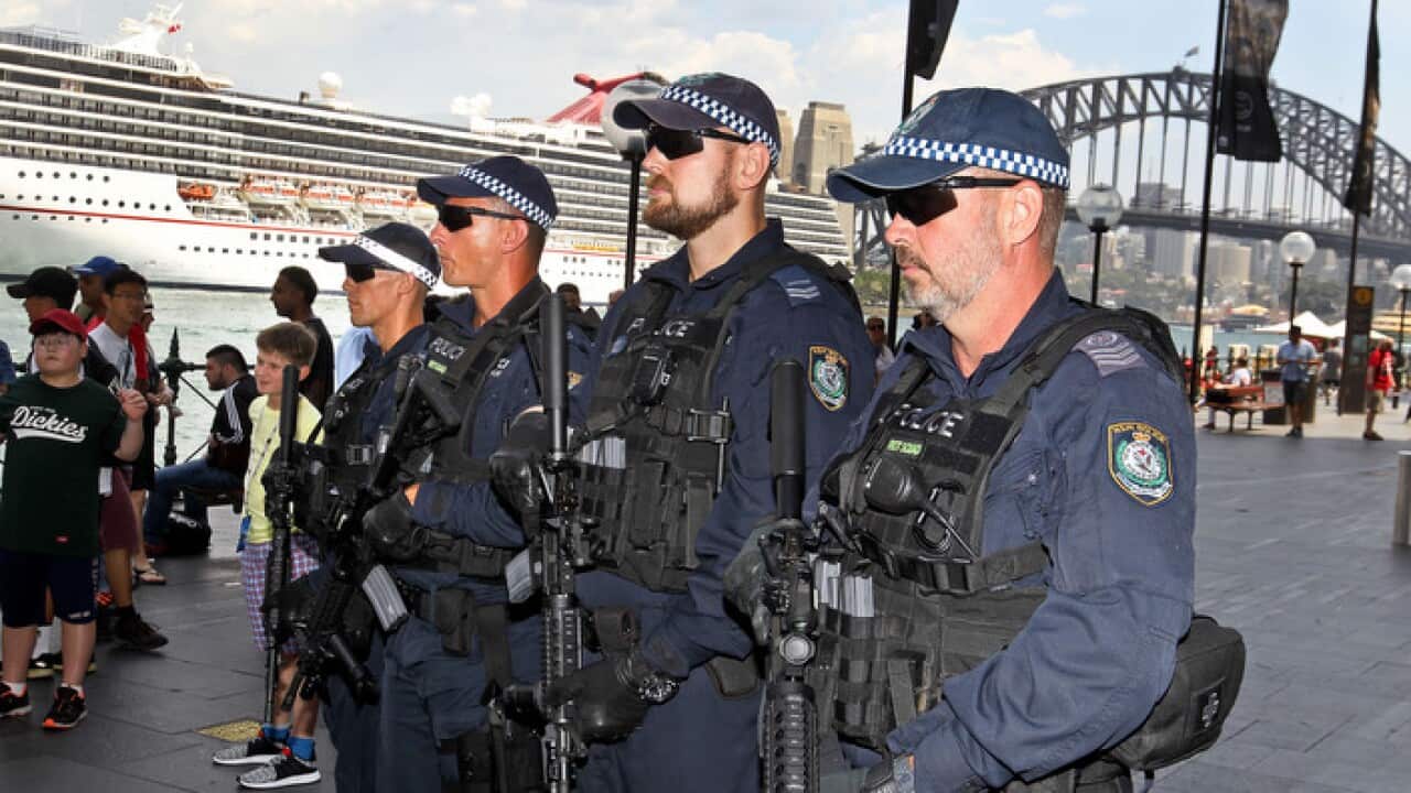 Police in front of the Sydney Harbour Bridge