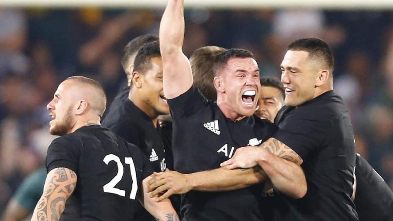 All Blacks players celebrating
