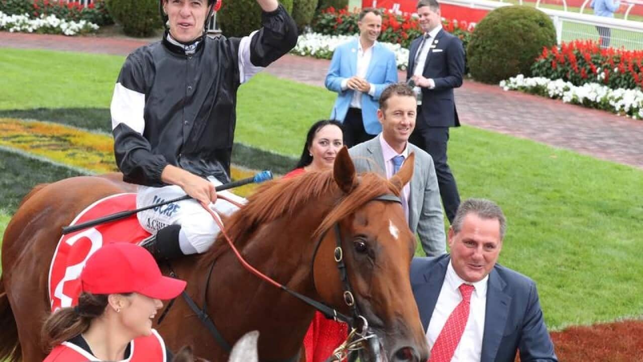 Jordan Childs with trainer Grahame Begg.