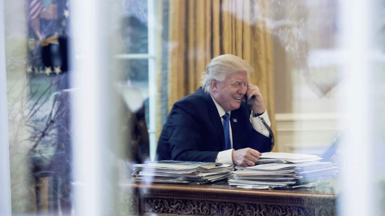 Donald Trump speaks on the phone with German Chancellor Angela Merkel