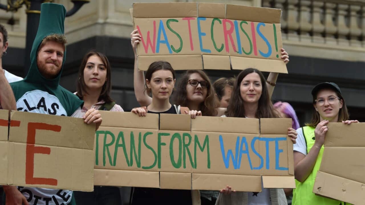 Protestors outside Parliament House in Melbourne in March, drawing attention to Victoria's recycling problems