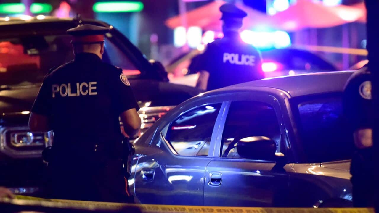 Police at the scene of a shooting in Toronto.