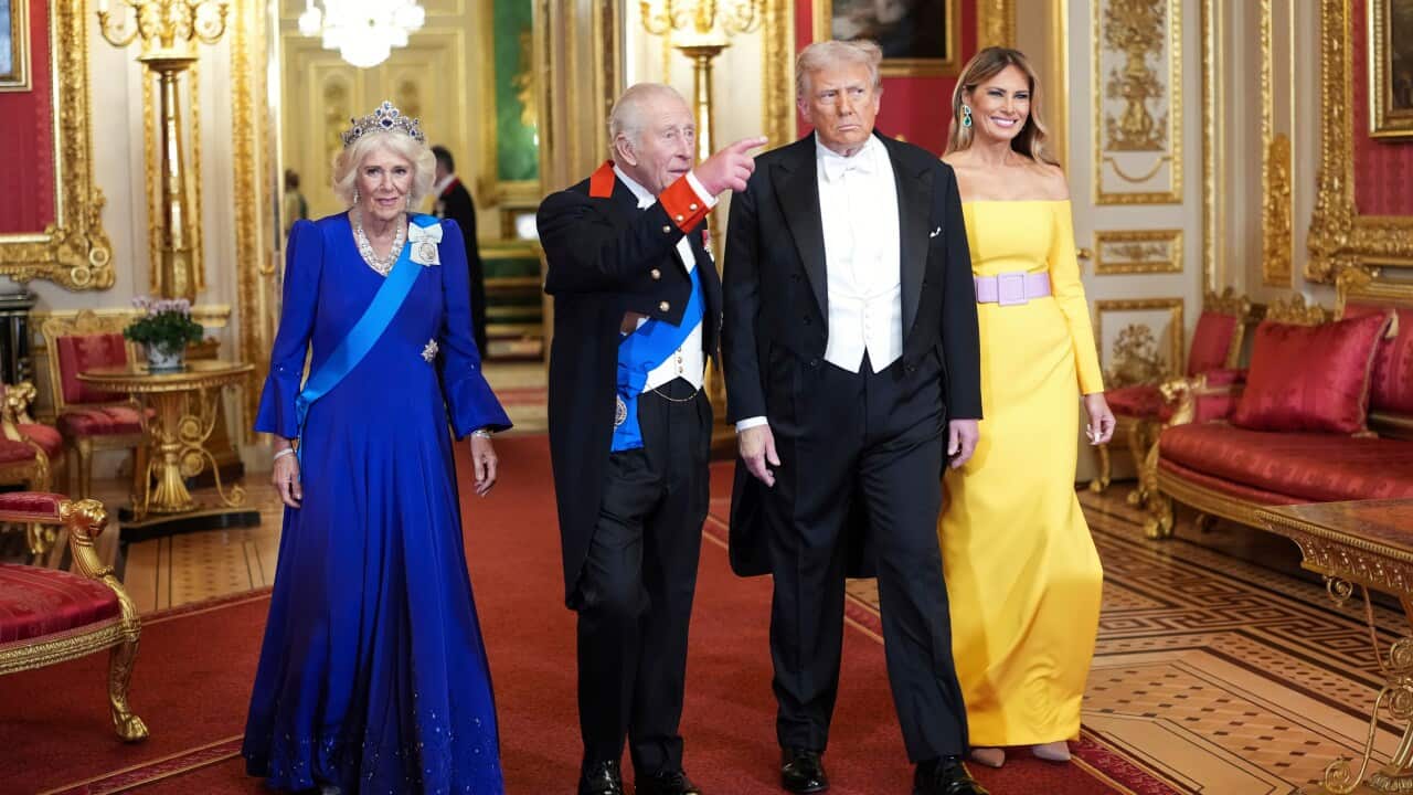 Queen Camilla, King Charles, Donald Trump and Melania Trump in an elegant gilded room.