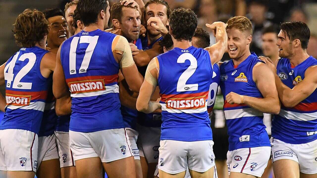 Bulldogs plays react after Travis Cloke kicked a goal