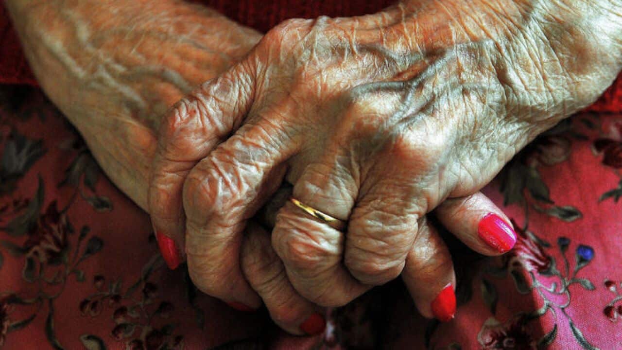 The hands of a resident at a nursing home as the ageing population is seen to be one of the top three challenges
