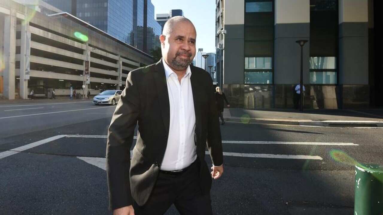 Queensland MP Billy Gordon walking through Brisbane