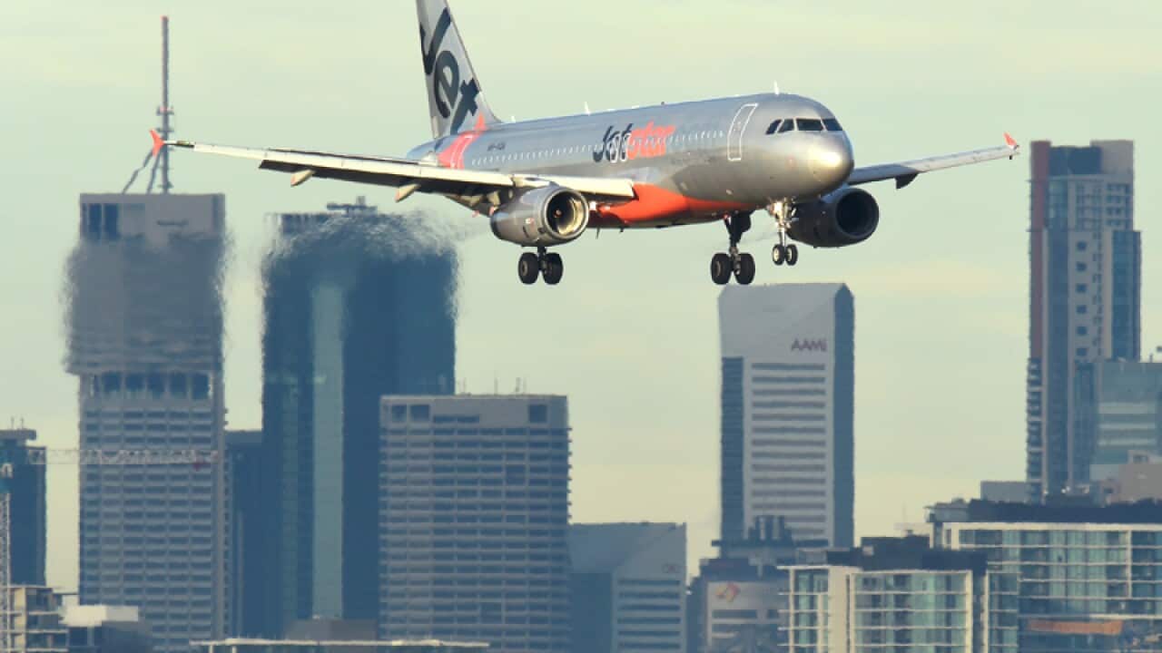 A Jetstar plane is seen on approach into Brisbane airport