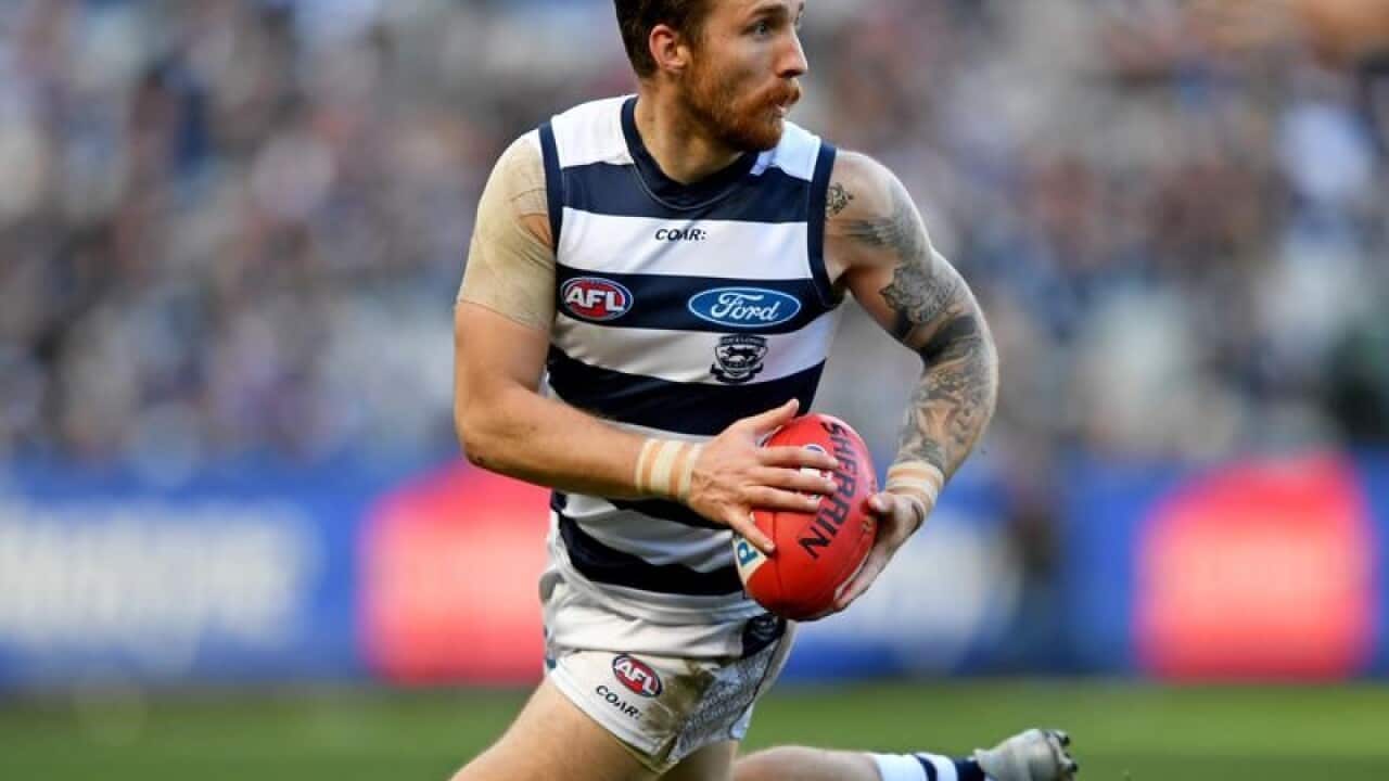 This is a file image of Zach Tuohy of the Cats running with the ball.