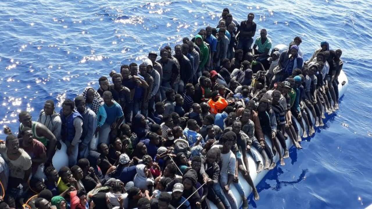 A file photo of migrants on a ship intercepted off the Libyan Coast in 2018