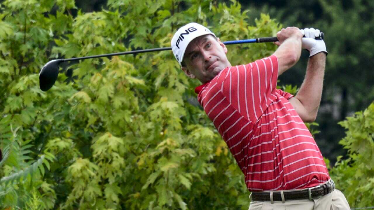 Kevin Sutherland tees off