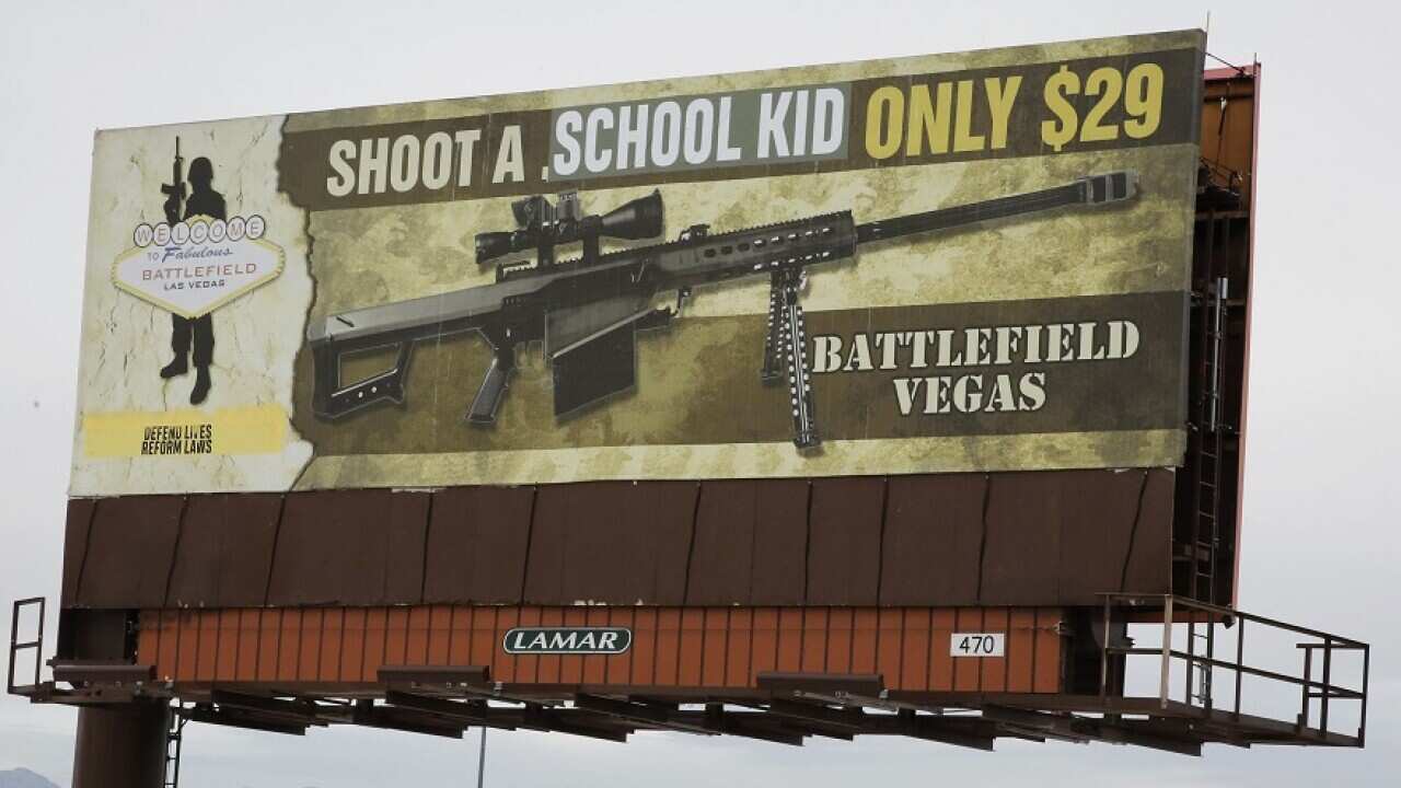 A vandalised billboard in Las Vegas calling attention to gun violence.