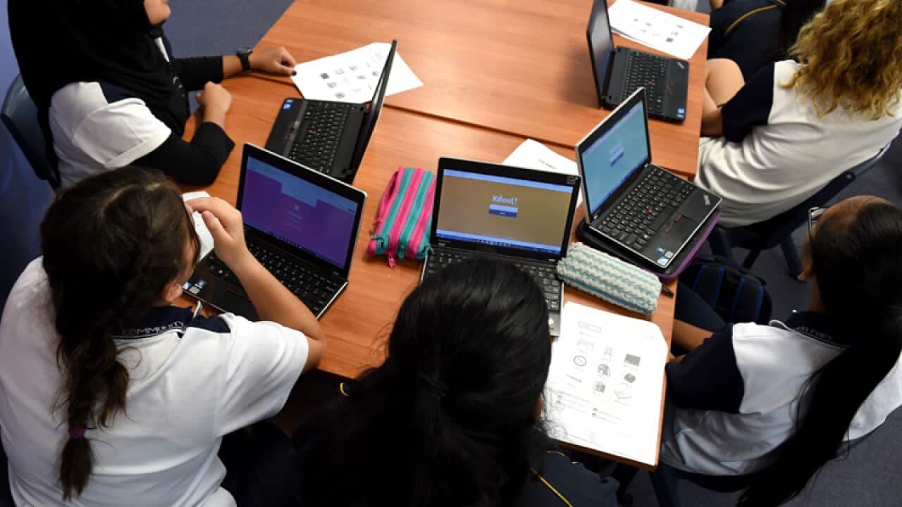 Students attend a class at Alexandria Park Community School