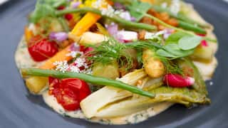 Spring garden vegetables with herb emulsion