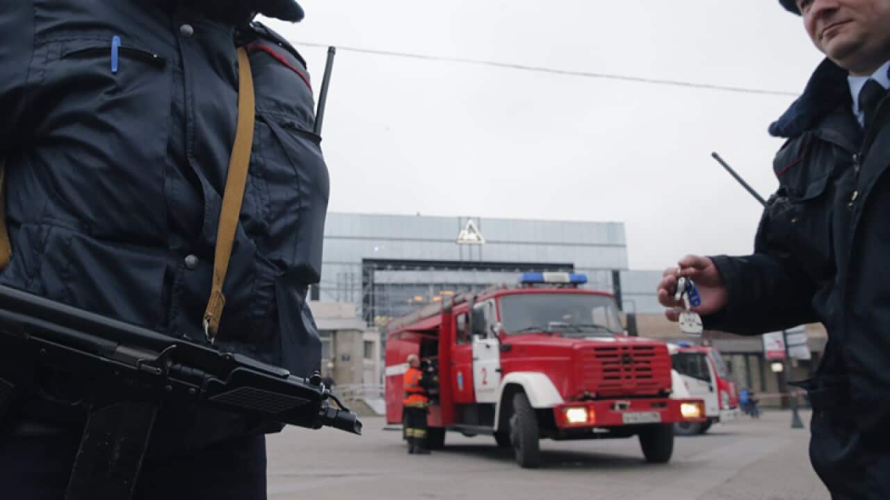 Police officers outside Sennaya Ploshchad metro station
