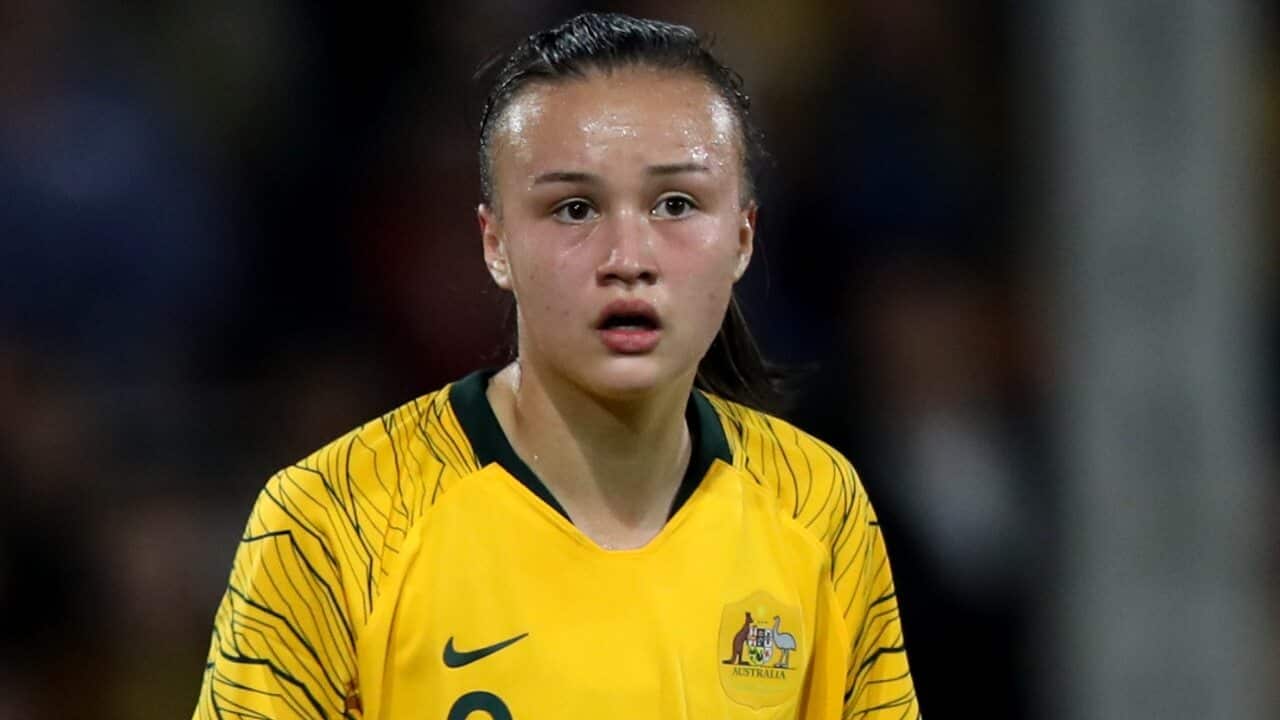 Amy Sayer in action for the Matildas