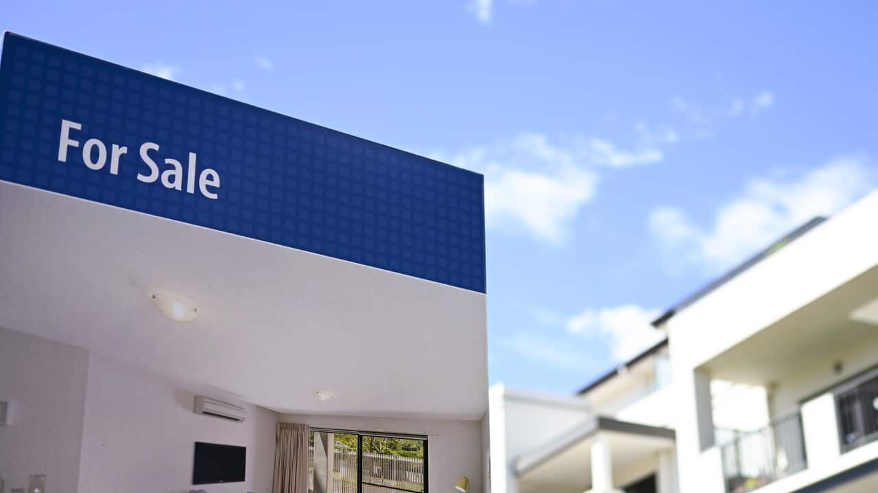 A real estate advertising board is seen next to a house in Canberra, Friday, March 1, 2019. (AAP Image/Lukas Coch) NO ARCHIVING