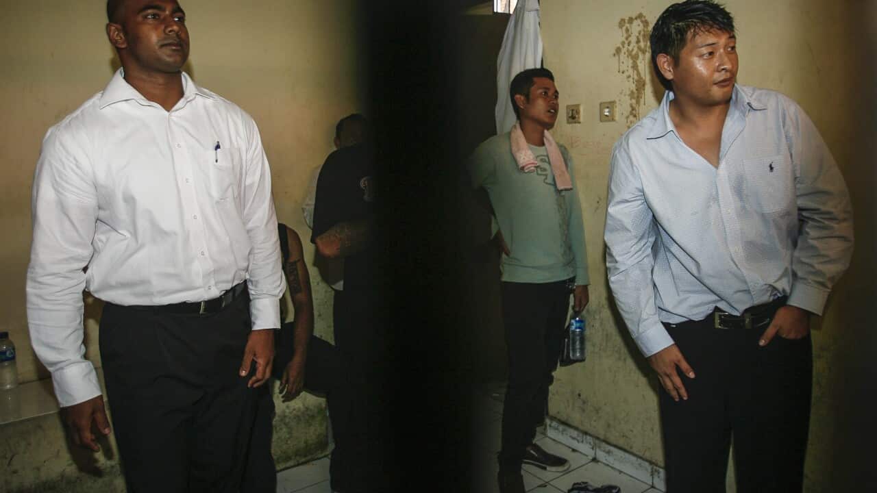 Andrew Chan (R) and Myuran Sukumaran (L) inside a holding cell (EPA/MADE NAGI)