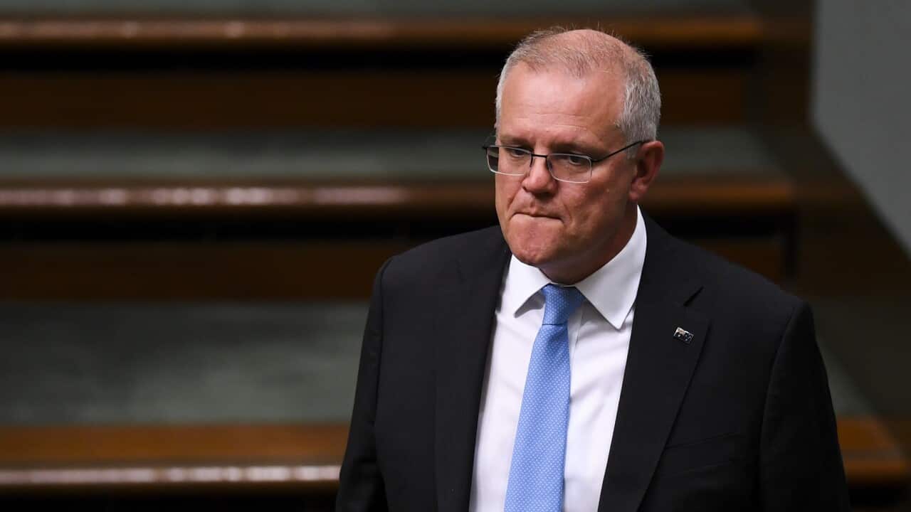 Australian Prime Minister Scott Morrison reacts during House of Representatives Question Time at Parliament House in Canberra, Tuesday, March 16, 2021. (AAP Image/Lukas Coch) NO ARCHIVING