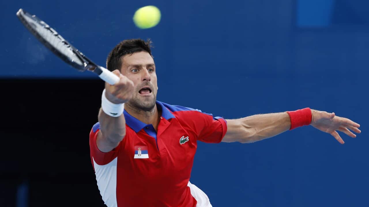 Novak Djokovic of Serbia in action against Jan-Lennard Struff of Germany during the Men's Singles Second Round Tennis match of the Tokyo 2020 Olympic Games at the Ariake Coliseum in Tokyo, Japan, 26 July 2021. EPA/MICHAEL REYNOLDS