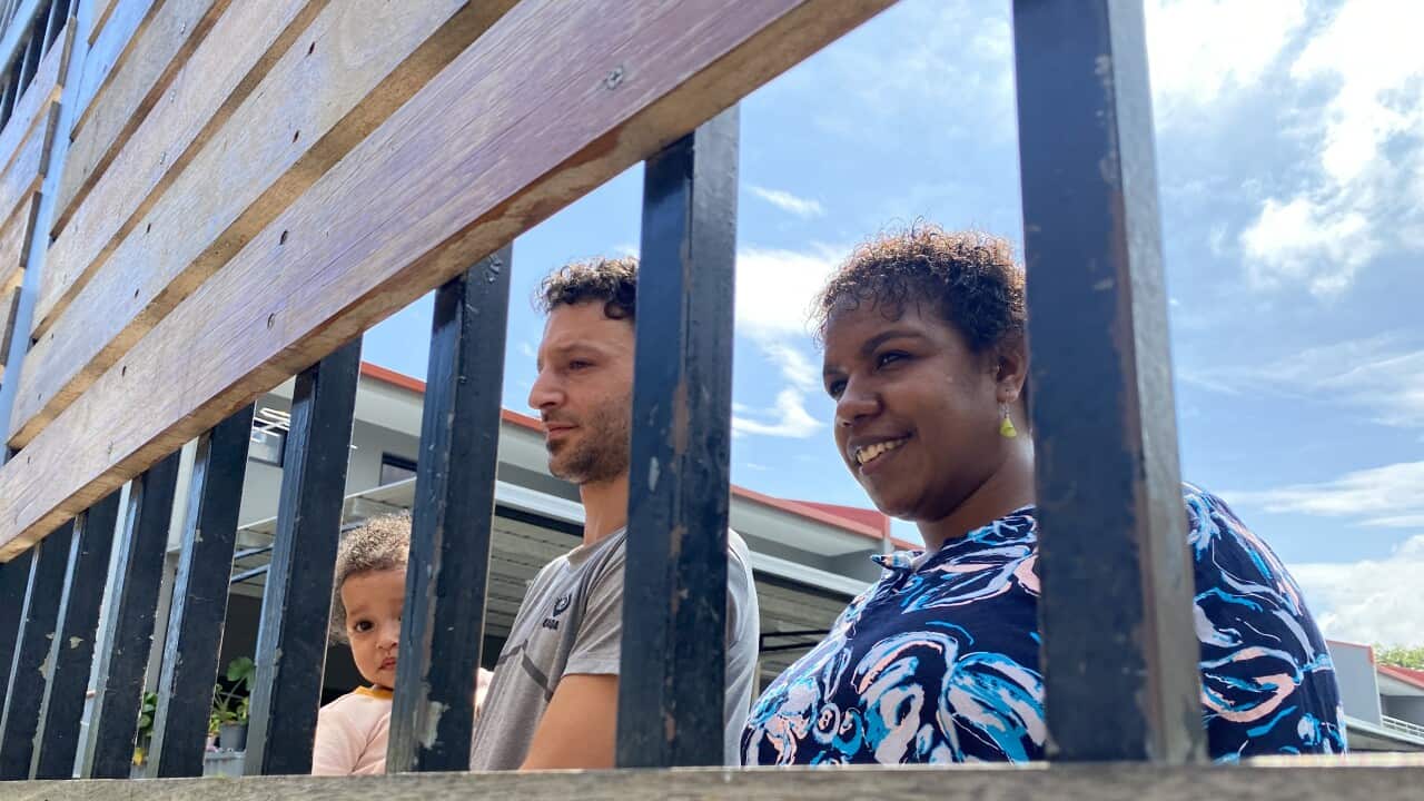 Iranian Mehrdad, his wife from Papua New Guinea Marie and their daughter Mania (SBS).jpg