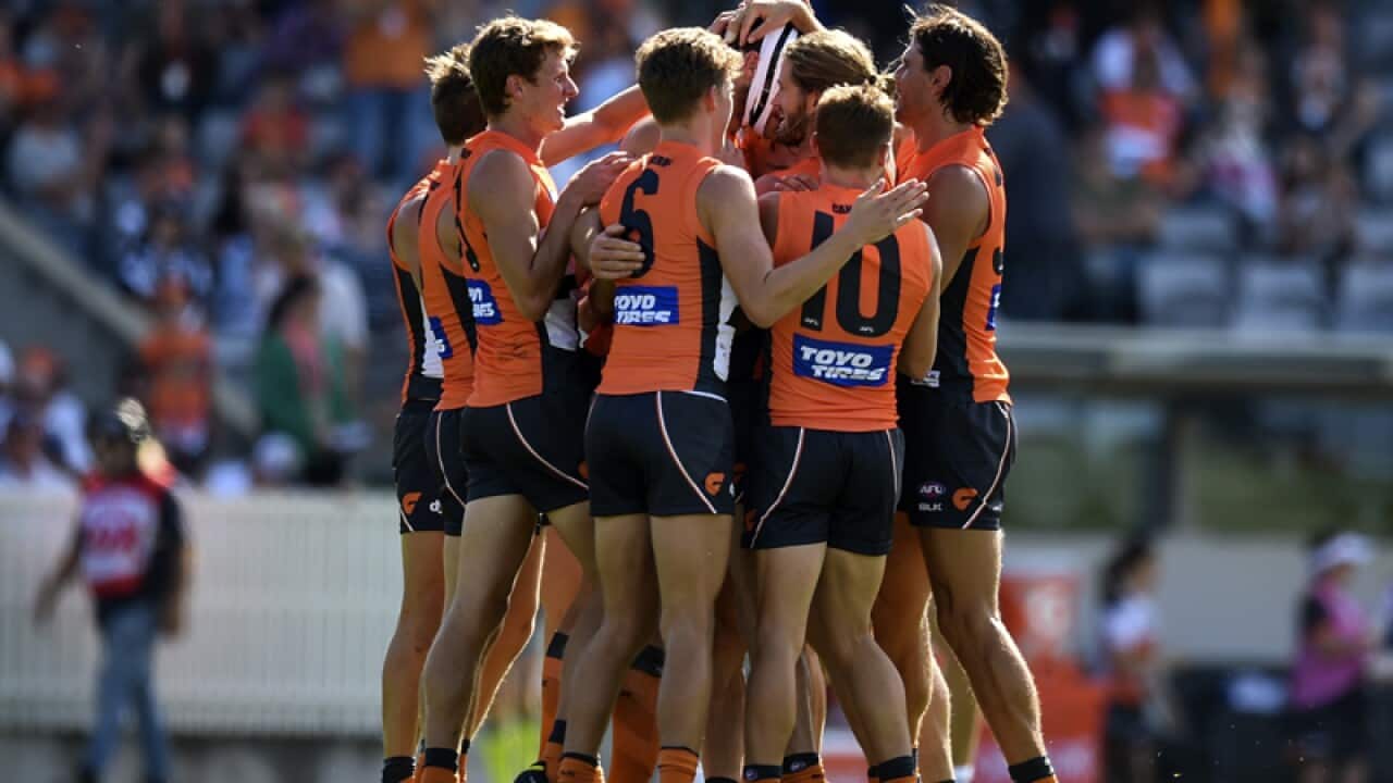 Shane Mumford of the Giants celebrates