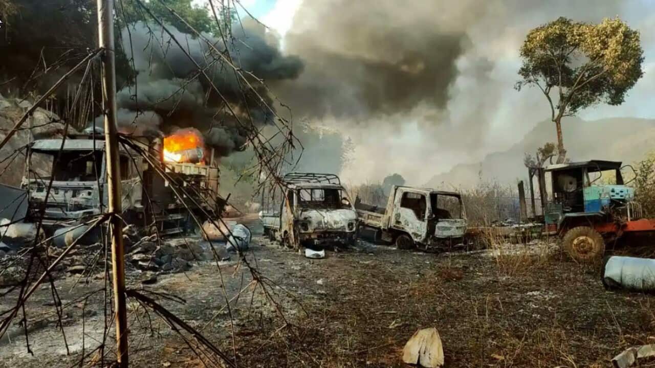 Smokes and flames billow from vehicles in Hpruso township, Kayah state, Myanmar, in the aftermath of the violence.