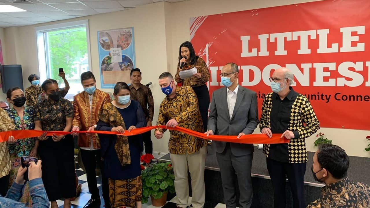 Cutting the Ribbon at the Opening of Little Indonesia in Somersworth, New