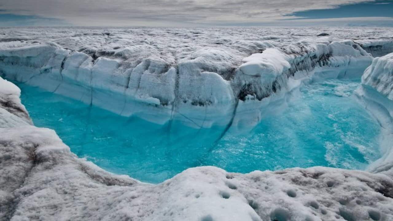 This July 4, 2012 image provided by Ian Joughin, shows surface melt water rushing along the surface of the Greenland Ice Sheet through a supra-glacial stream channel, southwest of Ilulissat, Greenland. 