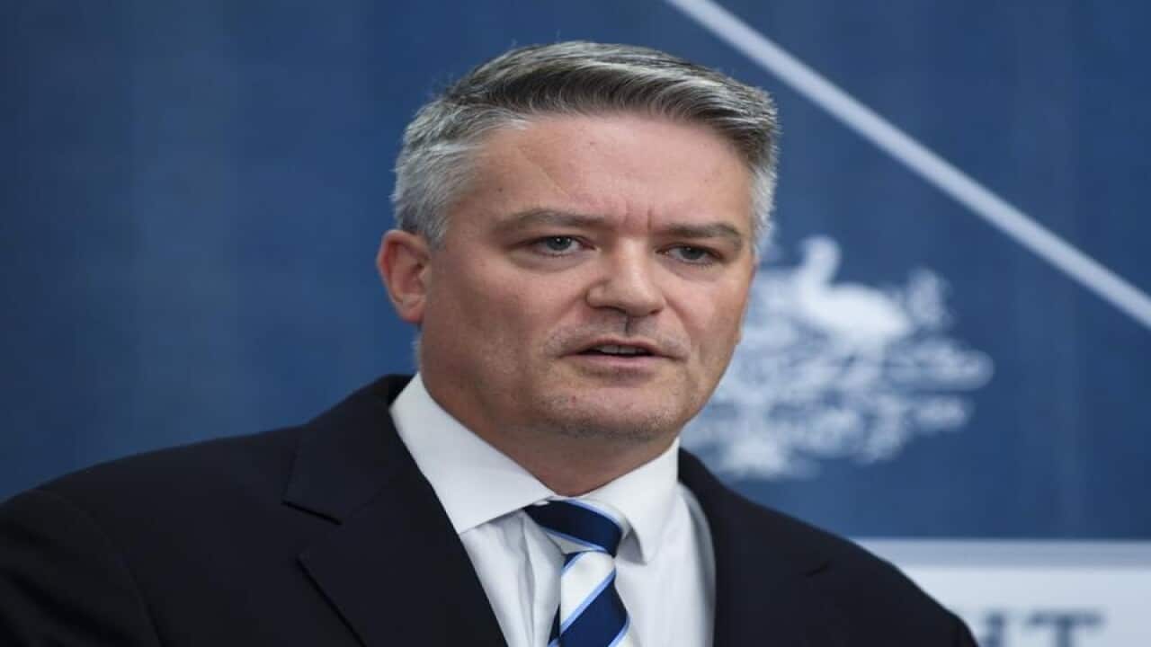 Mathias Cormann speaks during a press conference