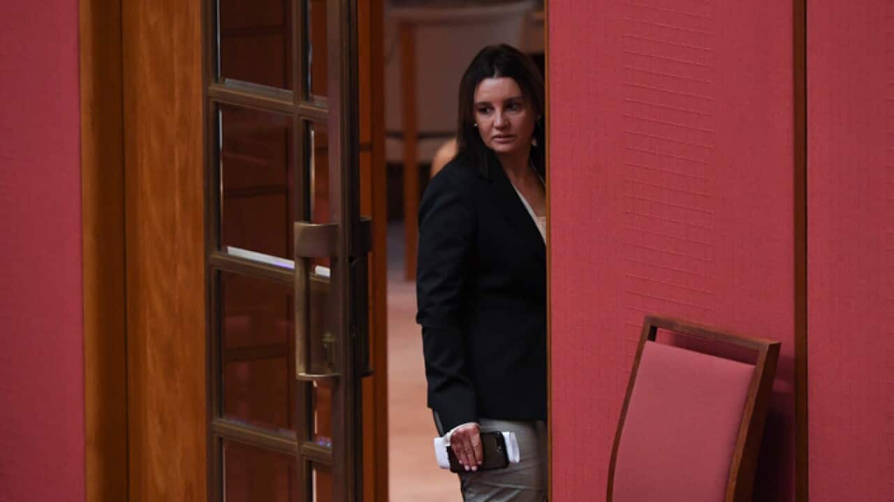 Independent Senator Jacqui Lambie reacts during debate on the Government's income tax package