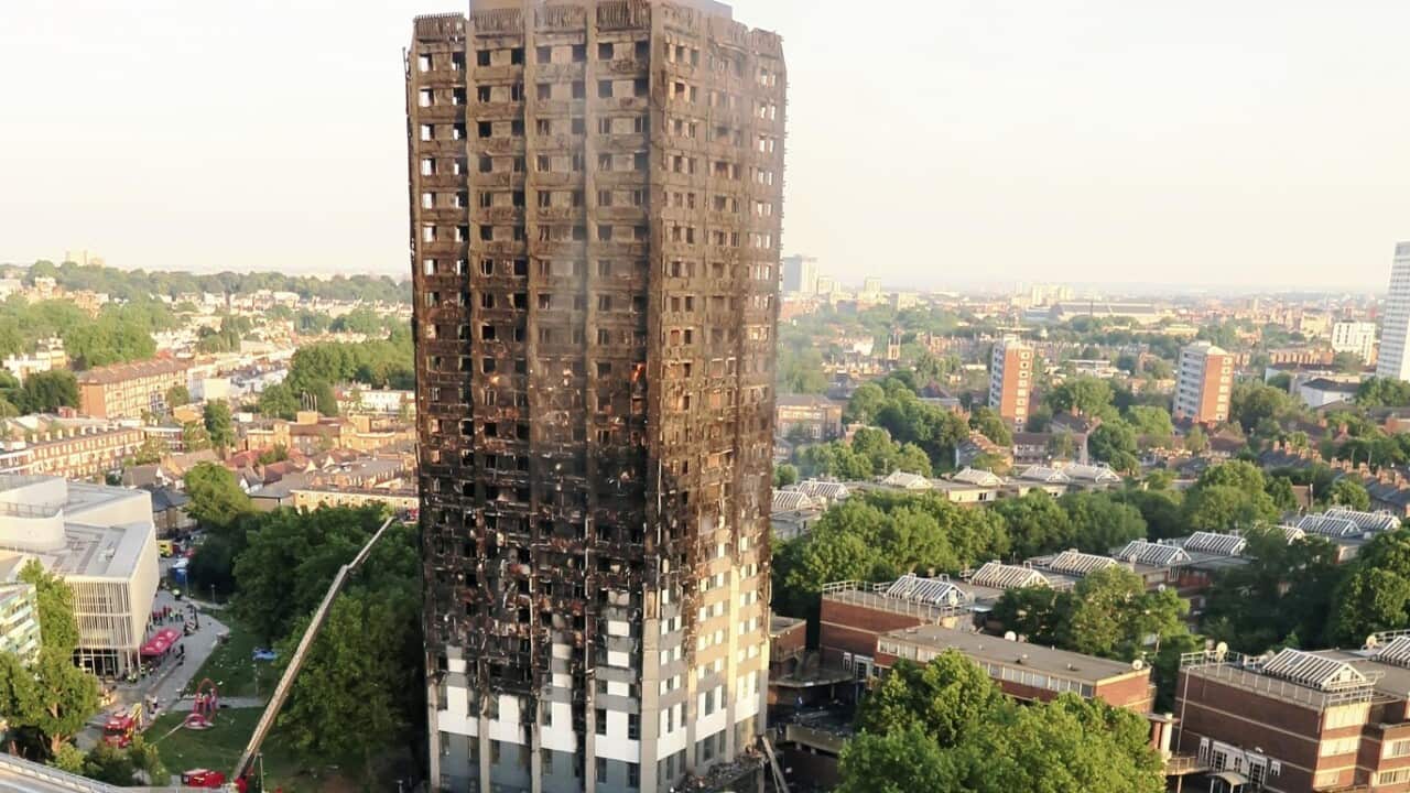This photo shows a high-rise condominium that became blackened by fire in London on July 14, 2017.
