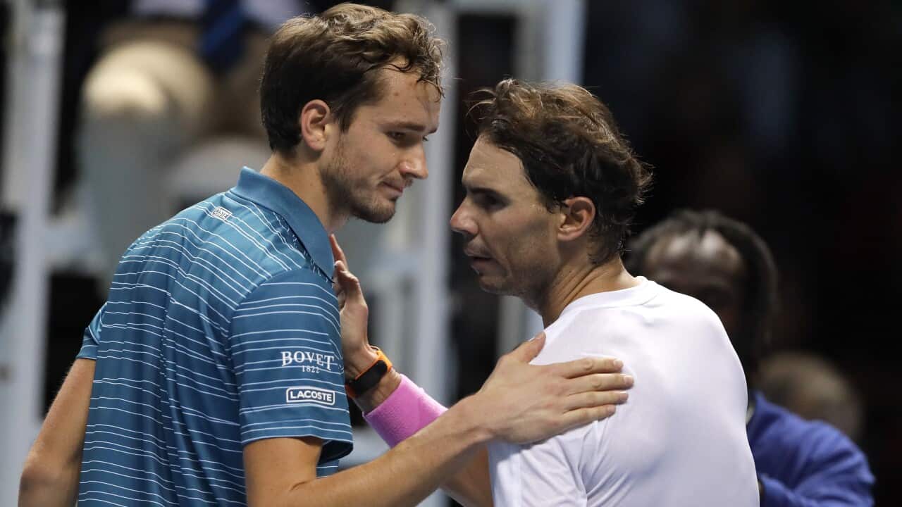 Rafael Nadal of Spain, right, after winning match point against Daniil Medvedev of Russia during their ATP World Tour Finals singles tennis match at the O2 Arena in London, Wednesday, Nov. 13, 2019. (AP Photo/Kirsty Wigglesworth)