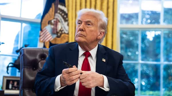 Trump dismisses security concerns over not-very-secret chat group as 'a witch hunt' image