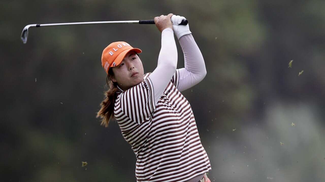 Feng Shanshan from China eyes her ball